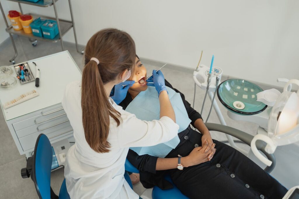 Patient visiting dentist for wisdom teeth removal checkup