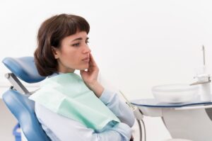Woman consulting dentist about wisdom teeth removal