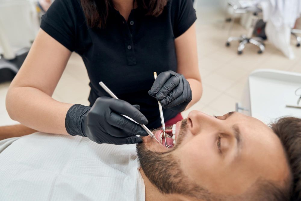 Professional tooth removal service by a dentist at Wisdom Teeth Professionals Sydney